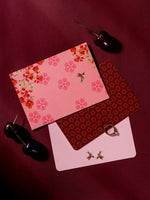 Blossom Notes thank-you cards in deep red with flame flowers