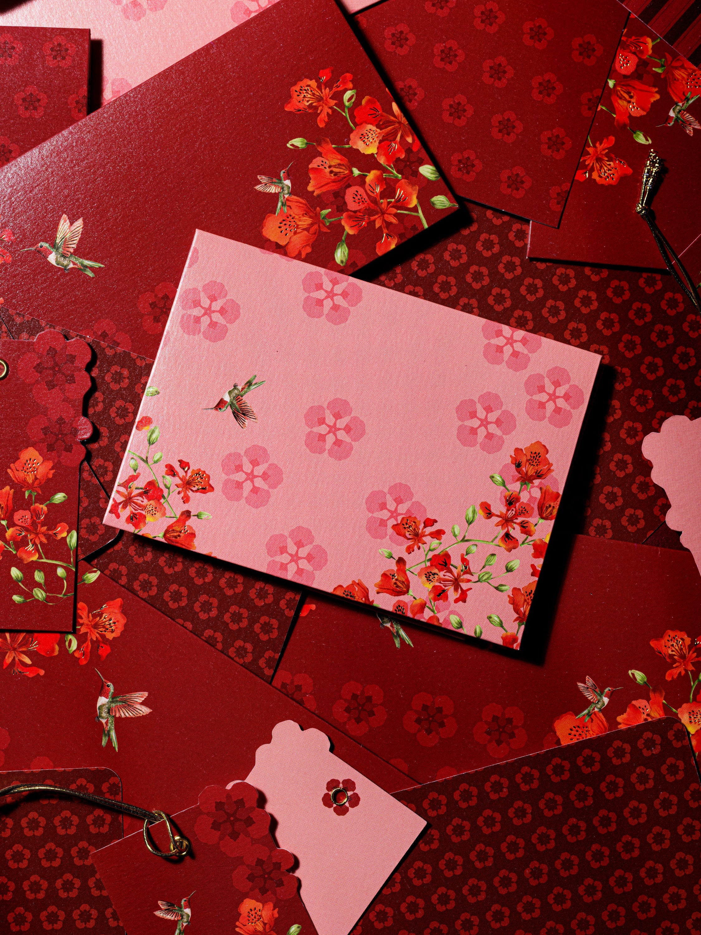 Blossom Notes thank-you cards — layered cards and tags in deep red and pink