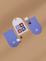 Coastal Escape gift tags in blue and cream with shell motifs