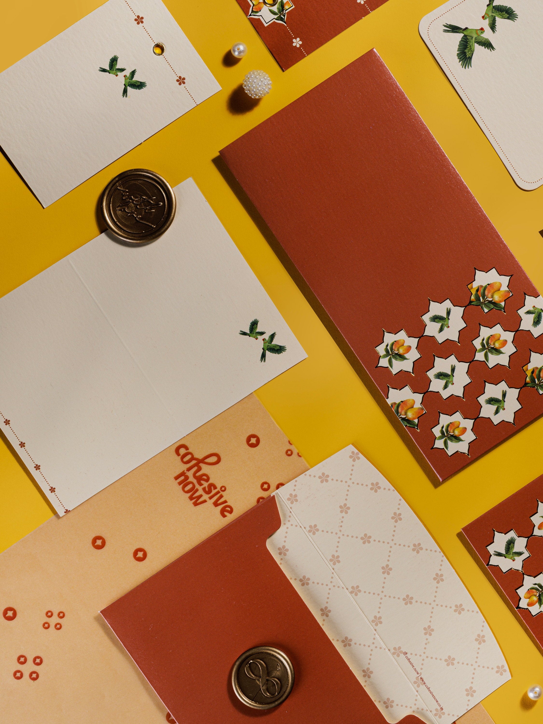 Mango Tales thank-you cards in terracotta with white star florals